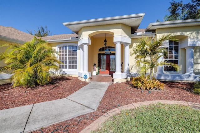 entrance to property featuring french doors