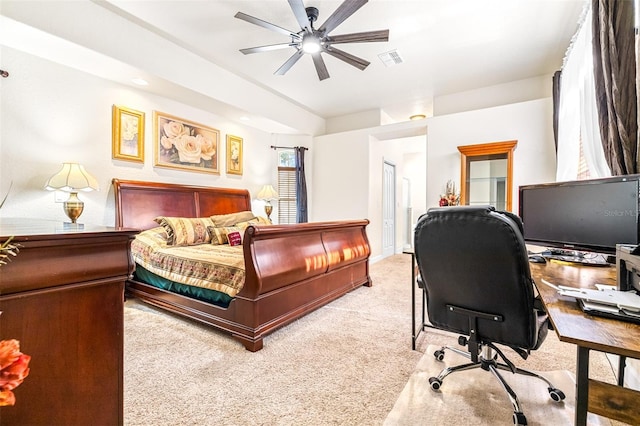 bedroom with light carpet and ceiling fan