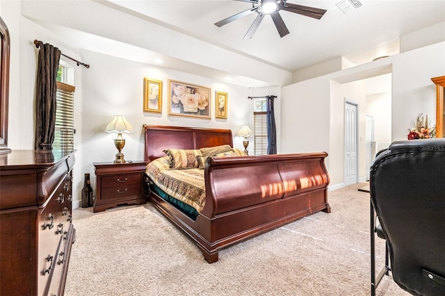 bedroom with light carpet, a closet, and ceiling fan