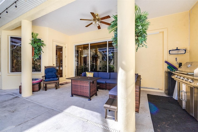 view of patio / terrace with ceiling fan and an outdoor living space