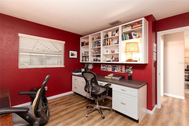 office space featuring light hardwood / wood-style floors