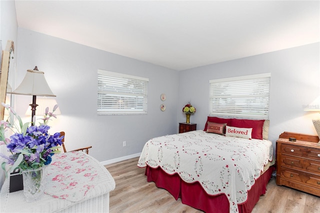 bedroom featuring light wood-type flooring