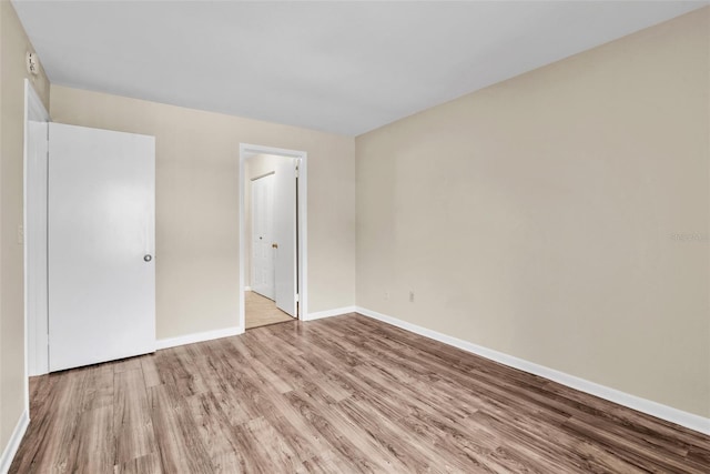 empty room with light wood-type flooring