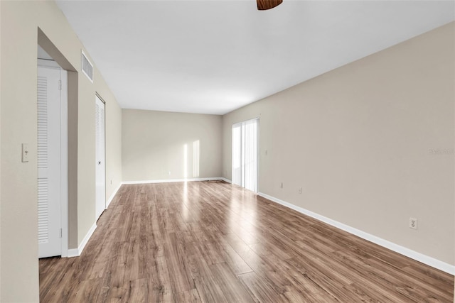 unfurnished bedroom featuring hardwood / wood-style flooring