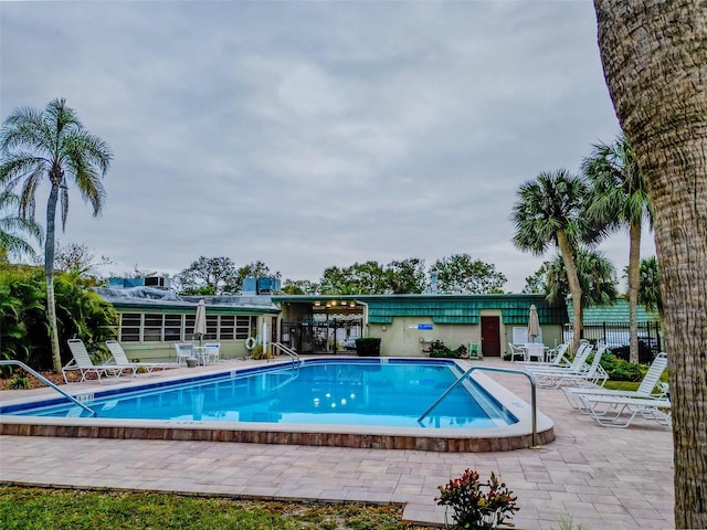 view of pool featuring a patio area