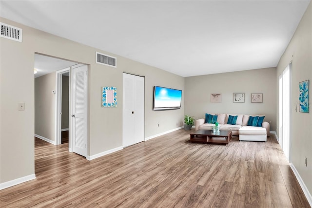 living room featuring light wood-type flooring