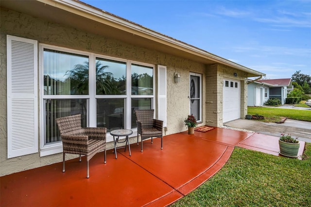 view of patio with a garage