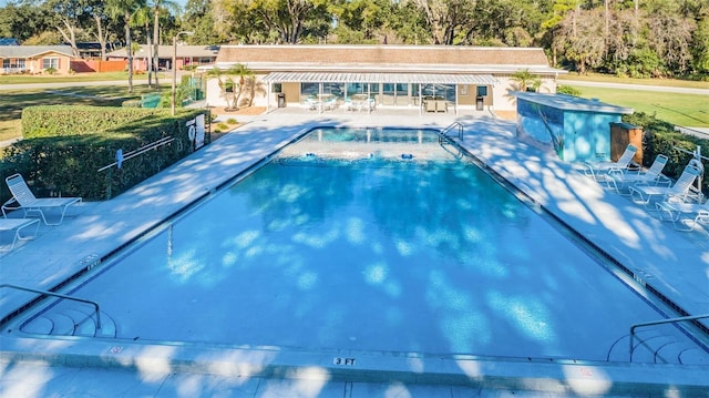 view of pool with a patio