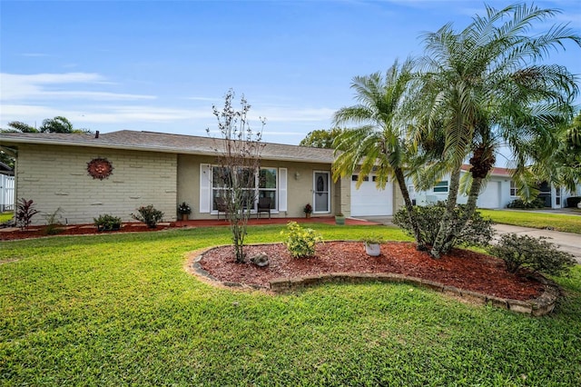 single story home with a garage and a front lawn