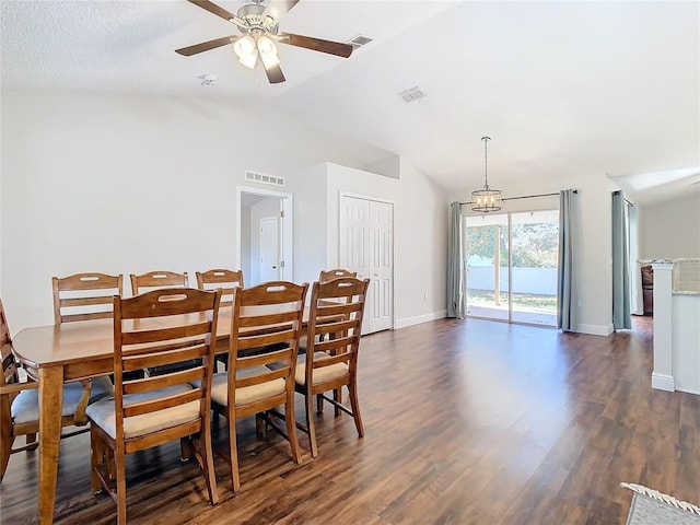 dining space with a textured ceiling, ceiling fan, dark hardwood / wood-style floors, and lofted ceiling