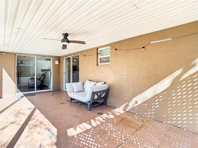 view of patio / terrace featuring ceiling fan