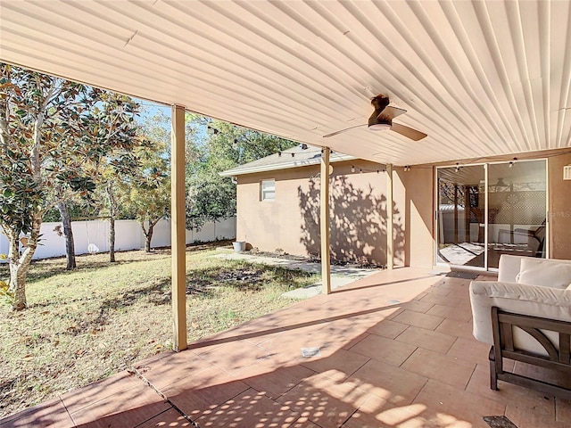 view of patio featuring ceiling fan