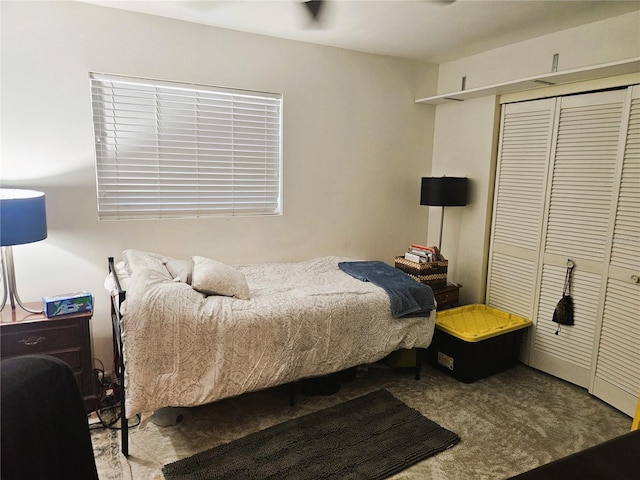 bedroom with a closet and carpet flooring