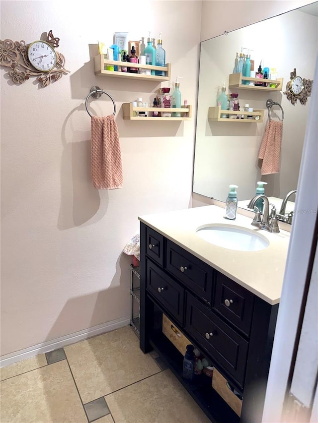 bathroom with vanity and tile patterned floors