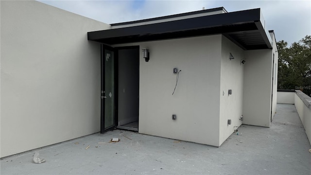 exterior space with stucco siding