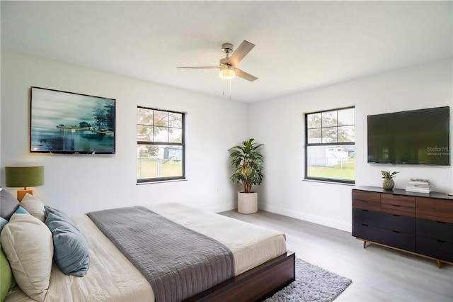 7631 Lewis Rd, Lakeland, FL 33810 - bedroom featuring baseboards and ceiling fan