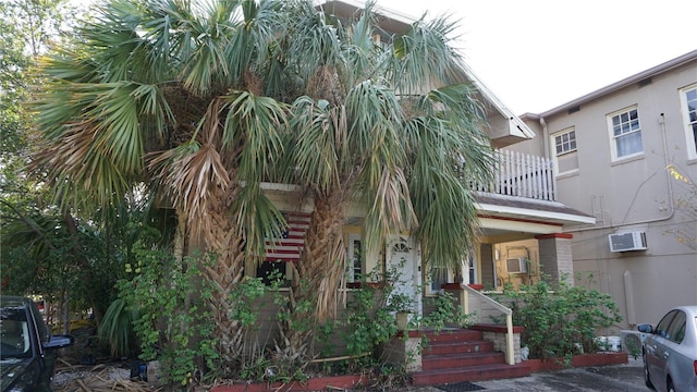 868 7th Ave N, Saint Petersburg, FL 33701 - exterior space featuring a balcony and a wall unit AC