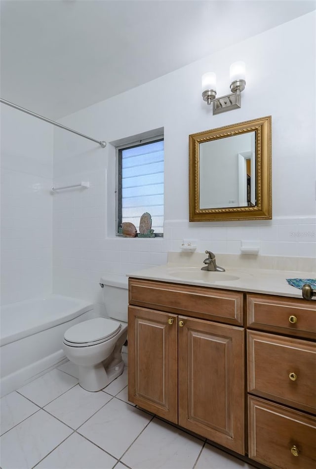 full bathroom with tile patterned floors, vanity, shower / bathtub combination, and toilet