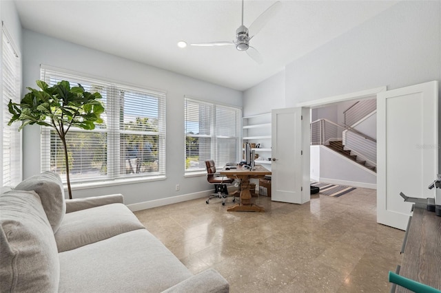 office with lofted ceiling and ceiling fan