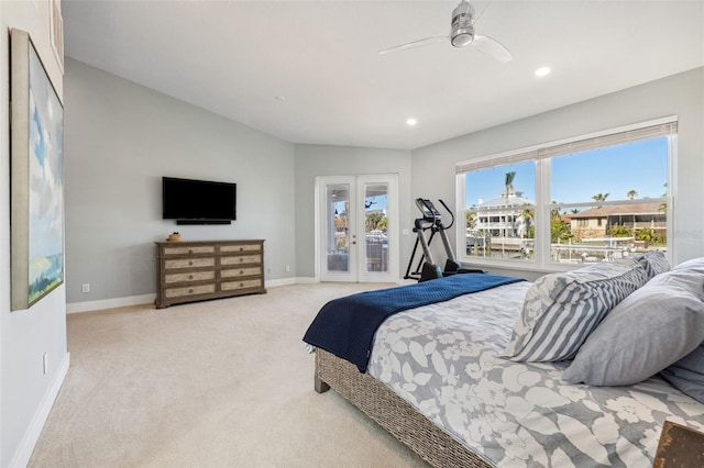 carpeted bedroom featuring french doors, ceiling fan, access to exterior, and vaulted ceiling