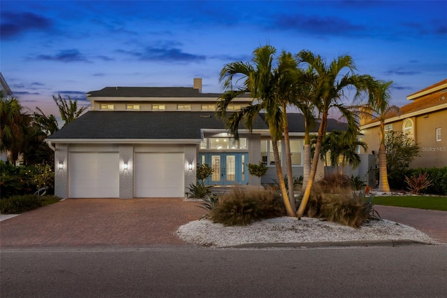 view of front of property featuring a garage