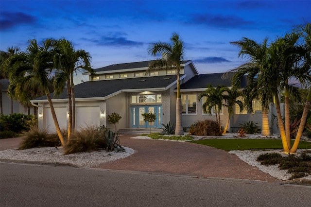 view of front of house with a garage