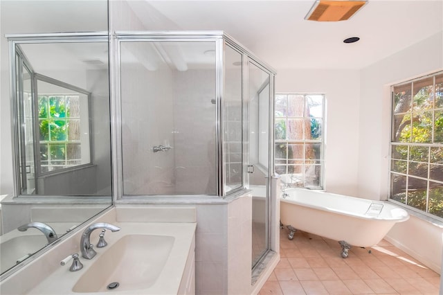 bathroom with separate shower and tub, tile patterned flooring, and vanity