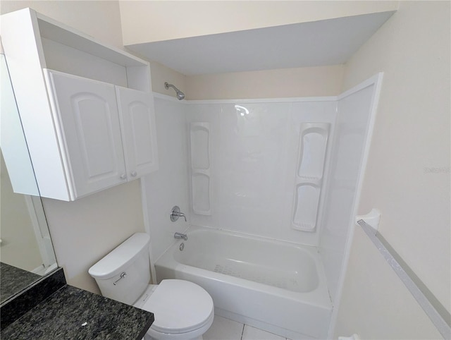 full bathroom with tile patterned floors, vanity, bathing tub / shower combination, and toilet