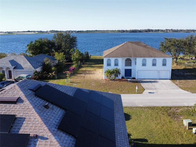 exterior space with a water view