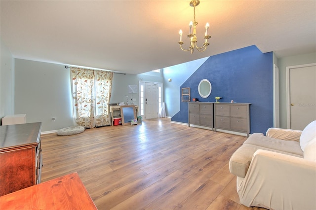 living room with an inviting chandelier and wood-type flooring