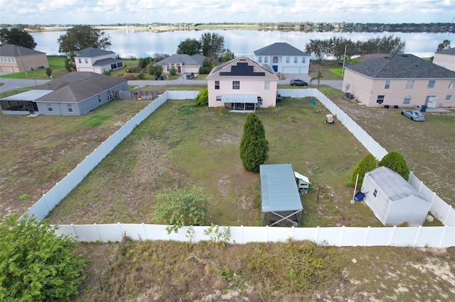 bird's eye view with a water view