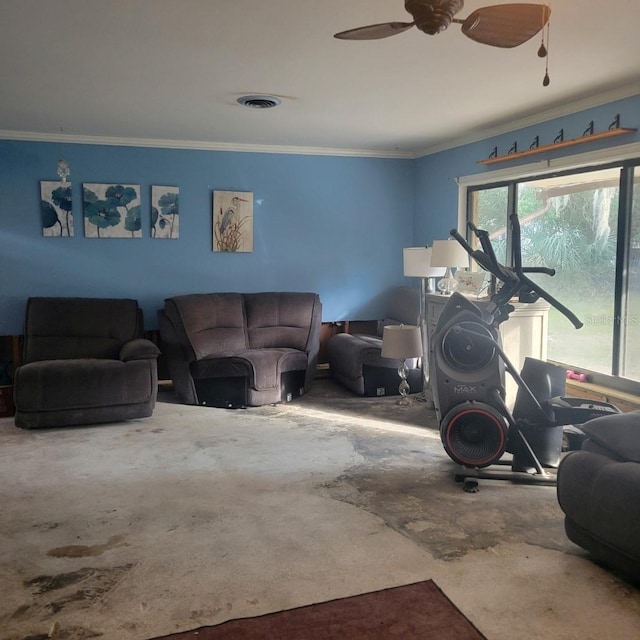 workout room featuring ceiling fan and crown molding