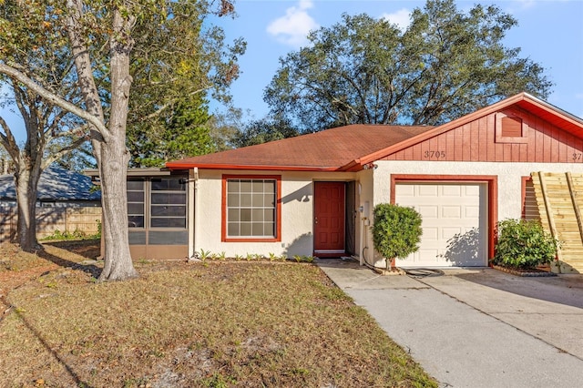 ranch-style home featuring a garage