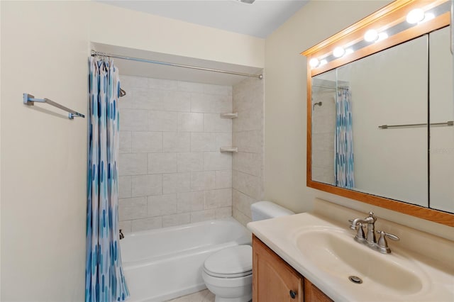 full bathroom featuring shower / tub combo, vanity, and toilet