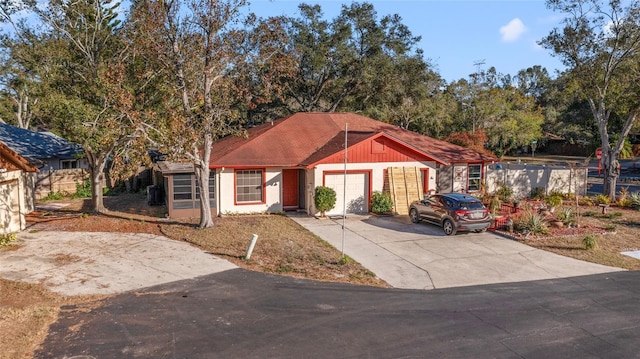 view of front of property with a garage