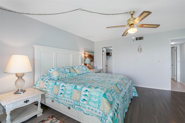 bedroom with ceiling fan and hardwood / wood-style flooring