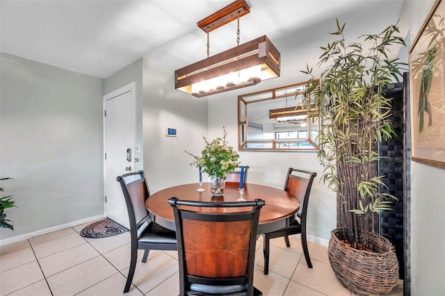 dining space with light tile patterned floors