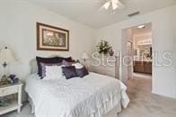 bedroom with carpet flooring and ceiling fan