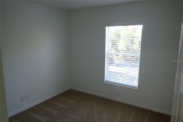 view of carpeted spare room