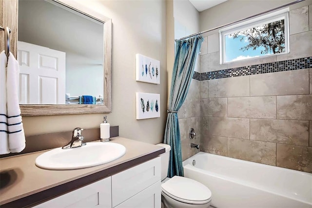 full bathroom with toilet, vanity, and shower / tub combo with curtain