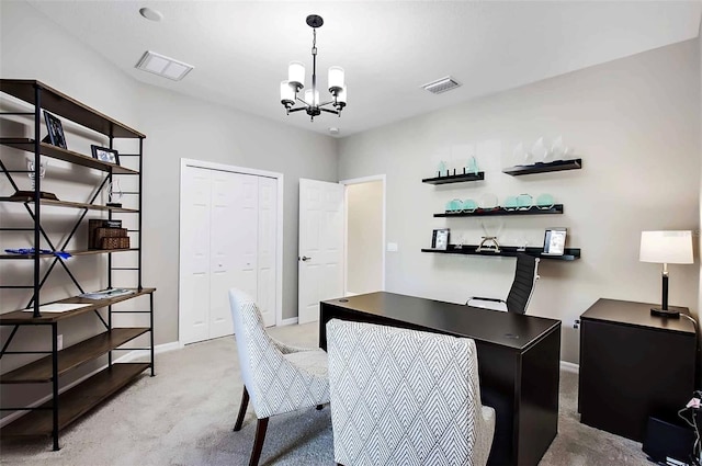 carpeted office space featuring an inviting chandelier