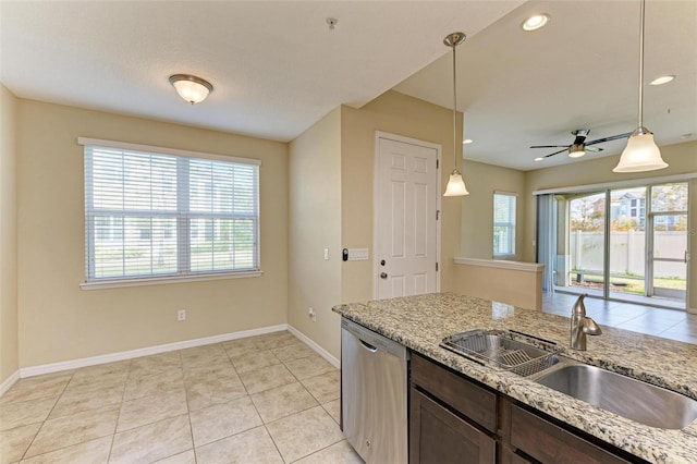 kitchen with dishwasher, pendant lighting, a healthy amount of sunlight, and sink