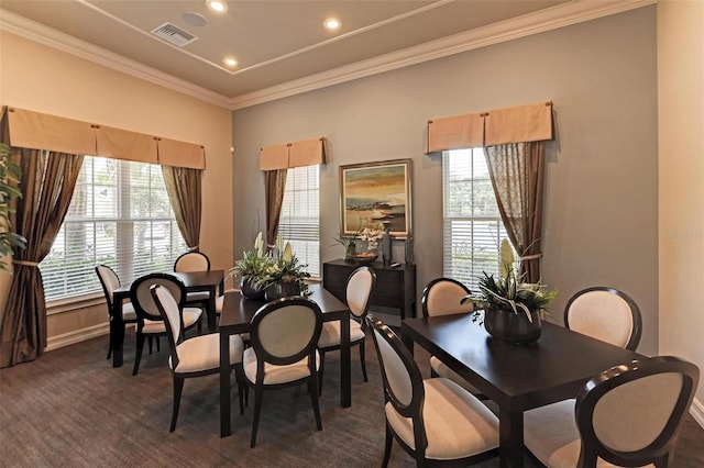 dining area with crown molding