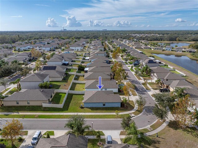 bird's eye view with a water view