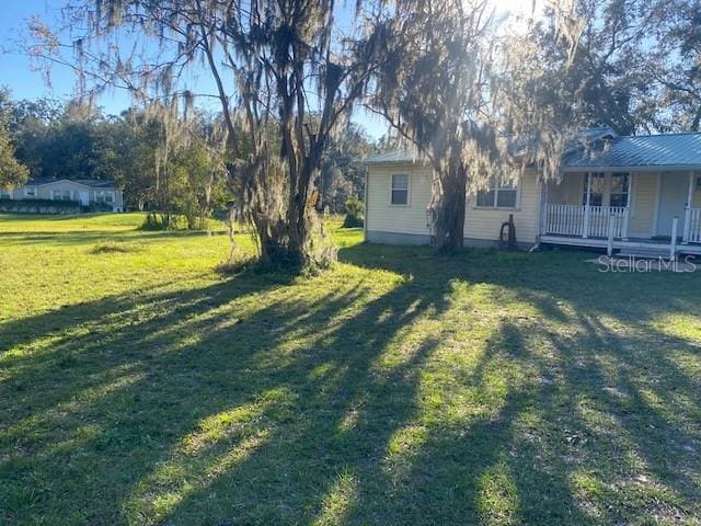 view of yard with a porch