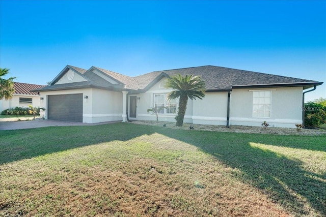 single story home featuring a garage and a front yard