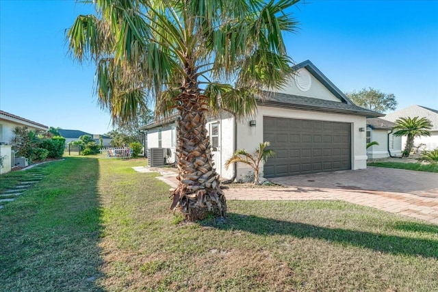 view of property exterior featuring a lawn and cooling unit