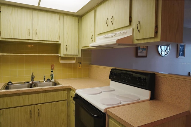 kitchen with decorative backsplash, light brown cabinets, white range with electric cooktop, and sink