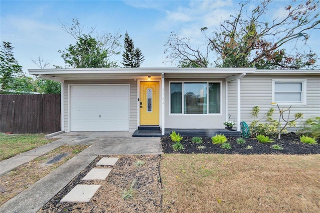 single story home with a garage