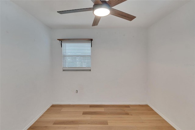 unfurnished room featuring light hardwood / wood-style floors and ceiling fan